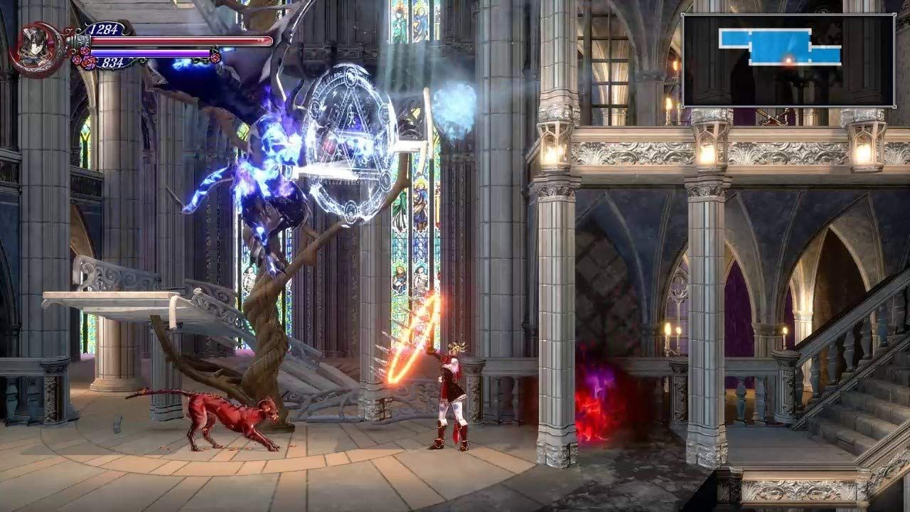 the player character brandishes a... ring of fire with knives? at a hellhound and a flying demon of some kind? in a cathedral? I dunno man it's an igarashi game